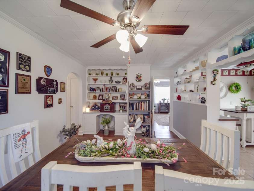 4450 Flowes Store Road, Concord, NC 28025.  MLS# CAR4231594, YatesRealty ID 6521. Dining Room w/ Built-In Shelves & Desk