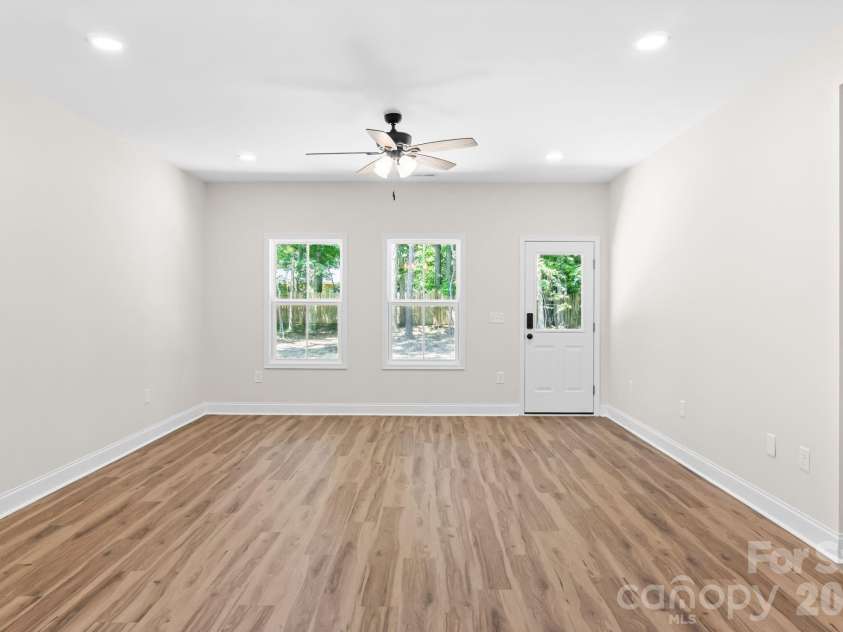 2123 Woodhurst Lane, Albemarle, NC 28001.  MLS# CAR4361996, YatesRealty ID 6532. Open floorplan from kitchen to living