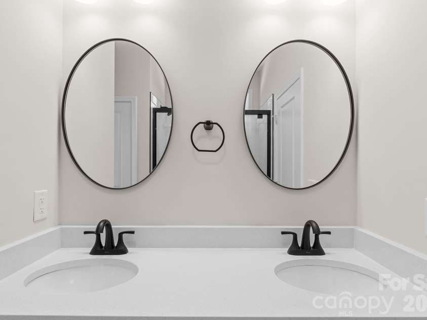 2123 Woodhurst Lane, Albemarle, NC 28001.  MLS# CAR4361996, YatesRealty ID 6532. Primary bathroom with double sink
