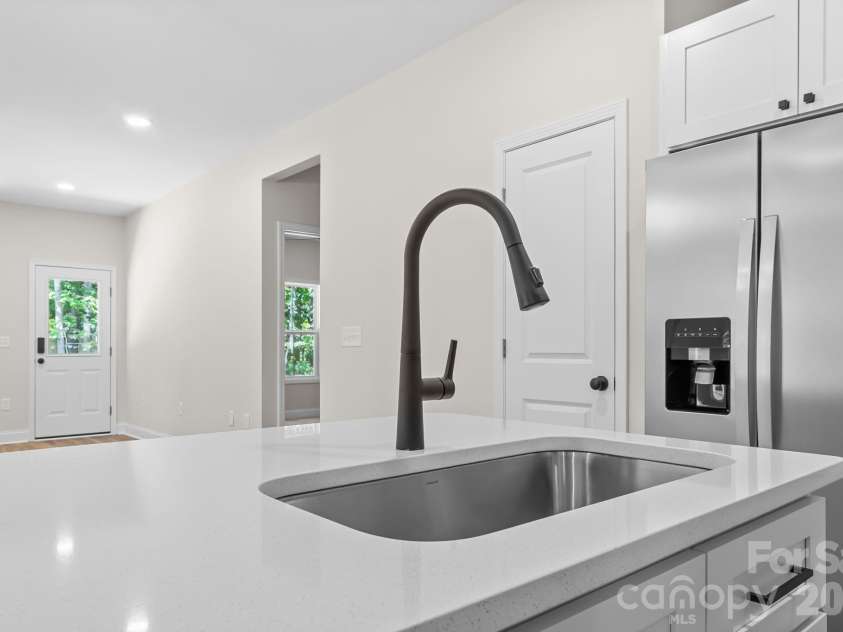 2123 Woodhurst Lane, Albemarle, NC 28001.  MLS# CAR4361996, YatesRealty ID 6532. Single bowl sink and large island