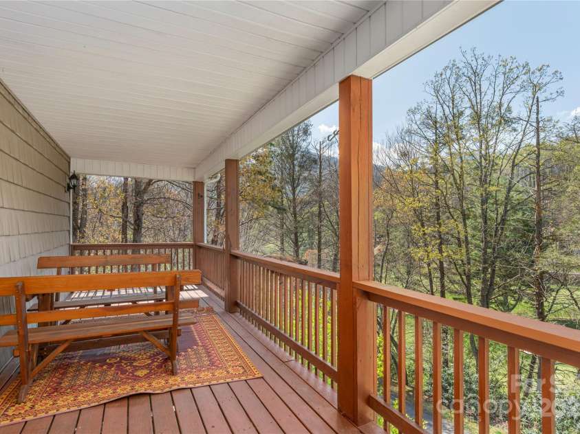 1429 Country Club Drive, Maggie Valley, NC 28751.  MLS# CAR4247939, YatesRealty ID 6536. Front Porch