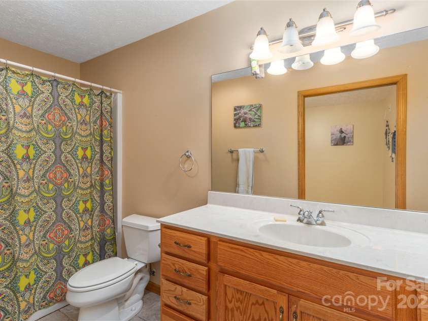 1429 Country Club Drive, Maggie Valley, NC 28751.  MLS# CAR4247939, YatesRealty ID 6536. Guest Bath