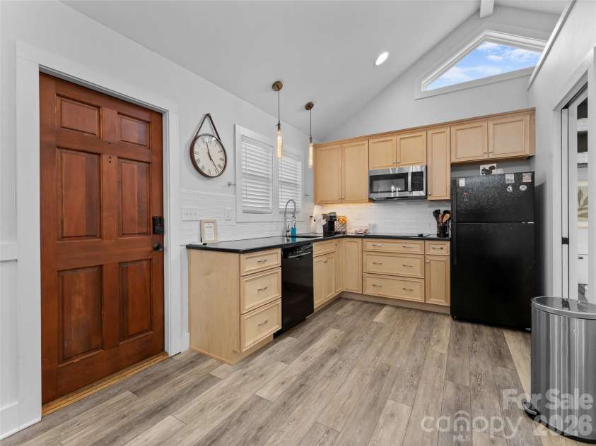 175 Duckworth Avenue, Brevard, NC 28712.  MLS# CAR4361938, YatesRealty ID 6539. Unit A - Entrance and Kitchen