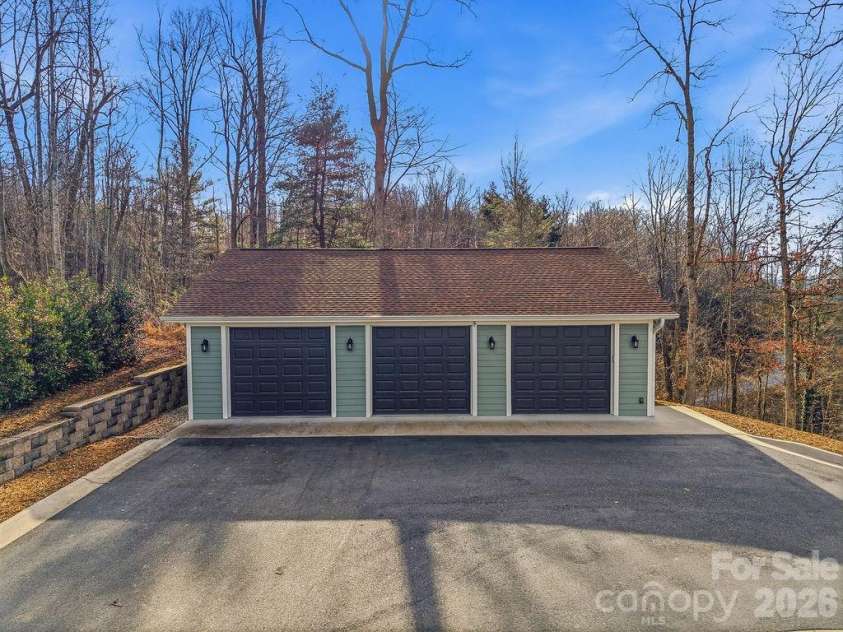 38 Sweetwater Oaks Drive, Fletcher, NC 28732.  MLS# CAR4331629, YatesRealty ID 654. Detached Garage