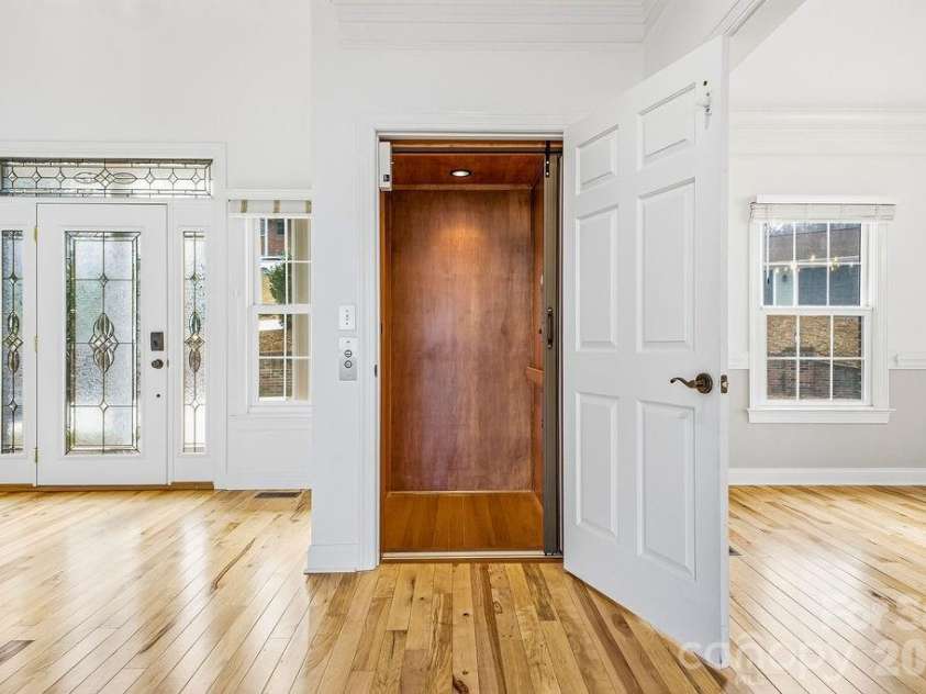 38 Sweetwater Oaks Drive, Fletcher, NC 28732.  MLS# CAR4331629, YatesRealty ID 654. Elevator serves all 3 levels.  Main level here.