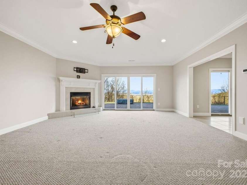 38 Sweetwater Oaks Drive, Fletcher, NC 28732.  MLS# CAR4331629, YatesRealty ID 654. Lower level family room