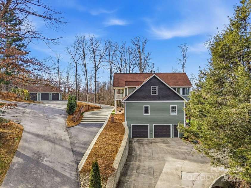 38 Sweetwater Oaks Drive, Fletcher, NC 28732.  MLS# CAR4331629, YatesRealty ID 654. Side driveway