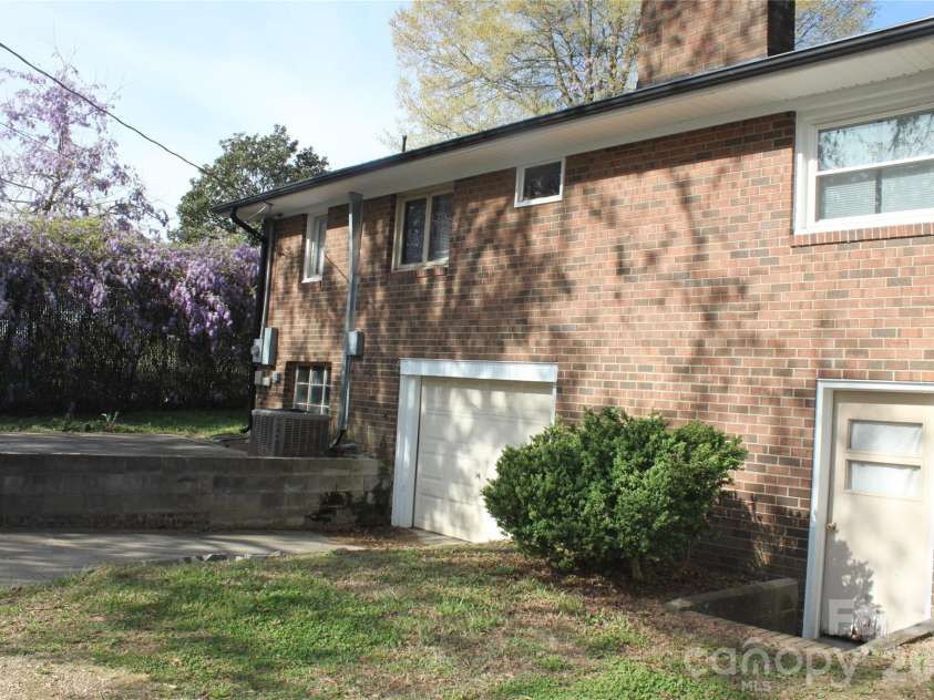 2210 Cannon Boulevard, Kannapolis, NC 28083.  MLS# CAR4355832, YatesRealty ID 6543. BACK VIEW AND TWO PARKING SPACES