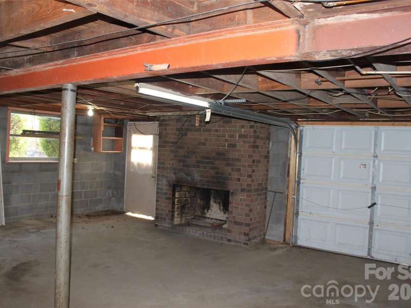 2210 Cannon Boulevard, Kannapolis, NC 28083.  MLS# CAR4355832, YatesRealty ID 6543. BASEMENT WITH FIREPLACE