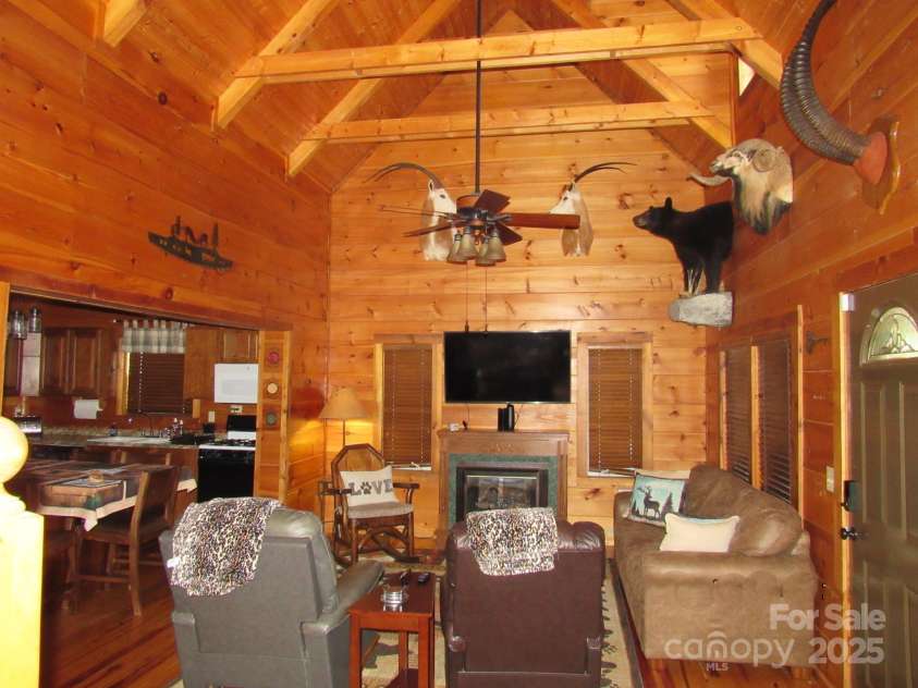 233 Rocky Top Road, Maggie Valley, NC 28751.  MLS# CAR4247300, YatesRealty ID 6543. Living room