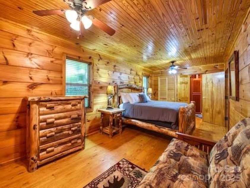 233 Rocky Top Road, Maggie Valley, NC 28751.  MLS# CAR4247300, YatesRealty ID 6543. Primary bedroom