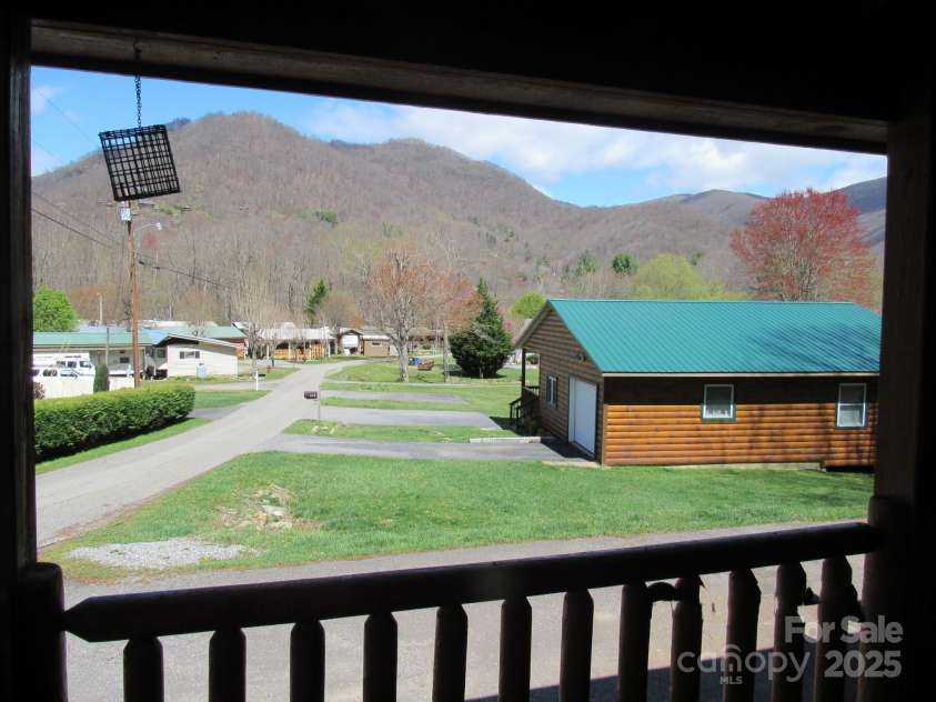 233 Rocky Top Road, Maggie Valley, NC 28751.  MLS# CAR4247300, YatesRealty ID 6543. View from front porch