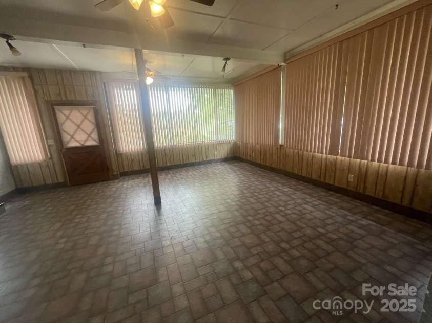 1620 Moss Springs Road, Albemarle, NC 28001.  MLS# CAR4248855, YatesRealty ID 6544. Sunroom... currently