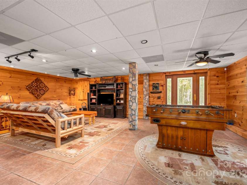 145 Flynn Court, Lake Lure, NC 28746.  MLS# CAR4247802, YatesRealty ID 6548. Basement Den/Gameroom