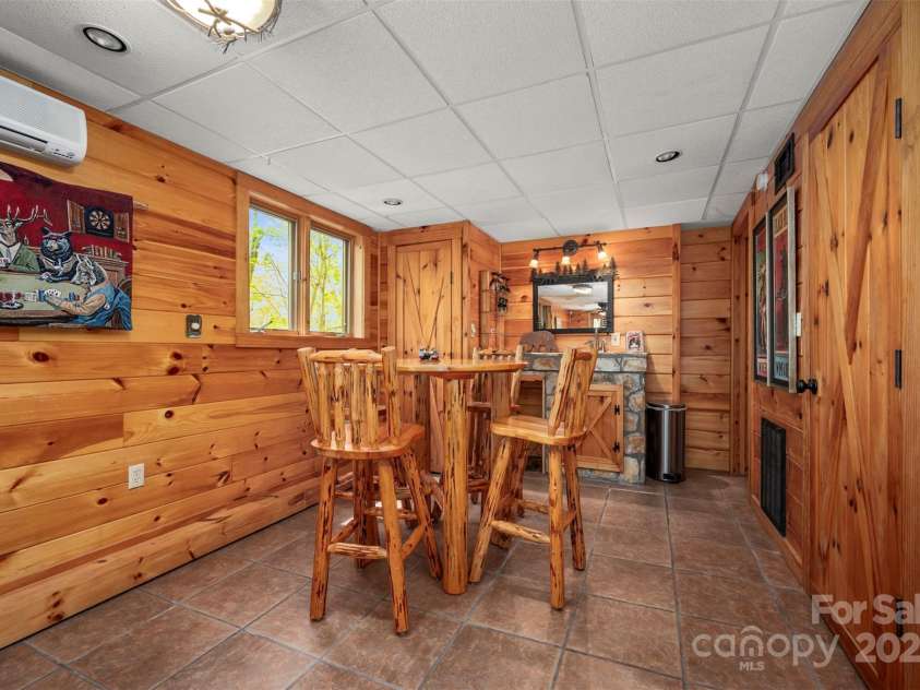 145 Flynn Court, Lake Lure, NC 28746.  MLS# CAR4247802, YatesRealty ID 6548. Basement Entertainment/Bar Area