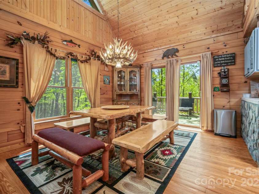145 Flynn Court, Lake Lure, NC 28746.  MLS# CAR4247802, YatesRealty ID 6548. Beautiful Dining area leading to the Deck