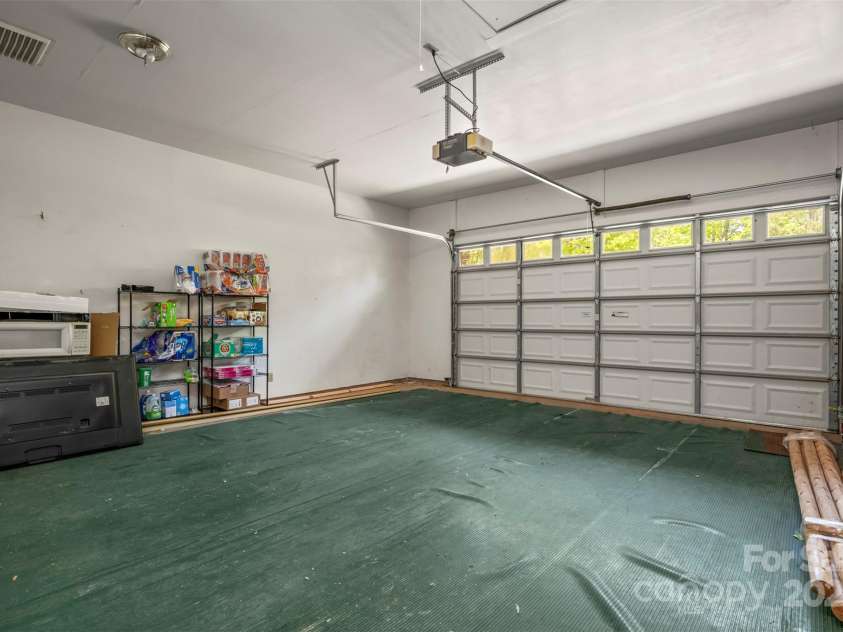 145 Flynn Court, Lake Lure, NC 28746.  MLS# CAR4247802, YatesRealty ID 6548. Garage