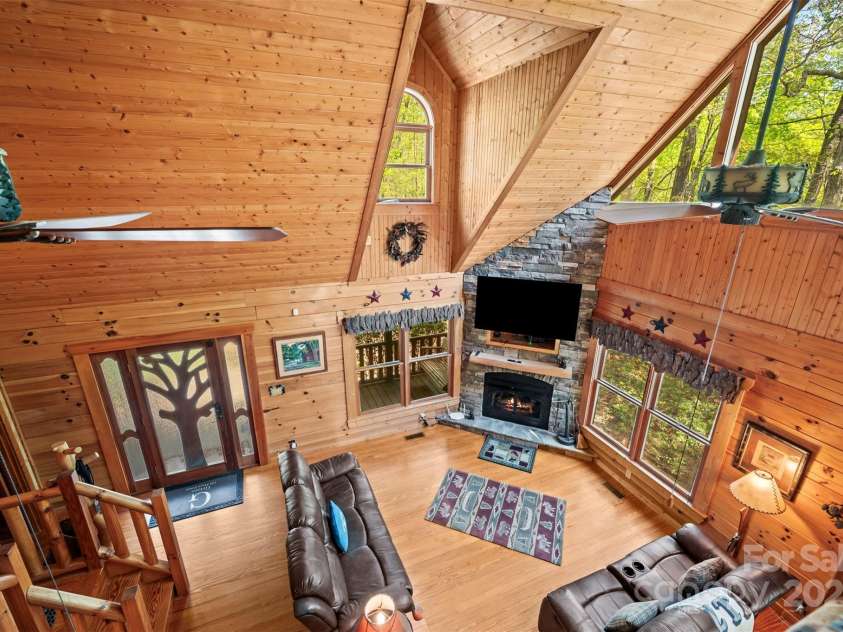 145 Flynn Court, Lake Lure, NC 28746.  MLS# CAR4247802, YatesRealty ID 6548. Greatroom from the Loft