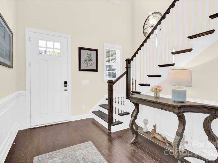 345 Somerled Way, Waxhaw, NC 28173.  MLS# CAR4242195, YatesRealty ID 6549. Open foyer with wood staircase