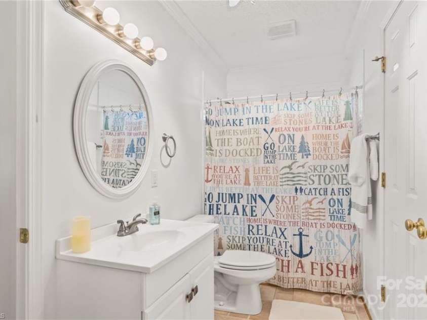 592 Shoreline Road, New London, NC 28127.  MLS# CAR4255512, YatesRealty ID 655. 