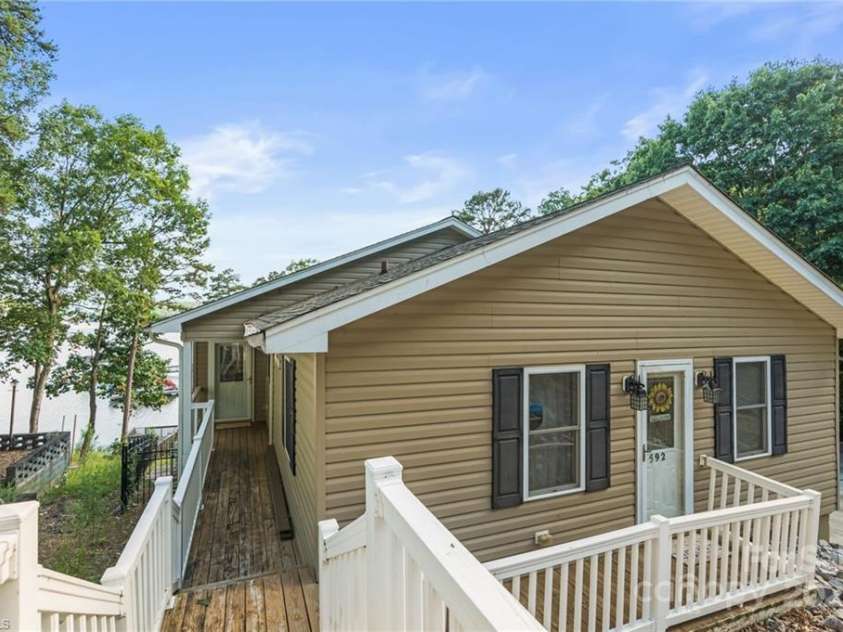 592 Shoreline Road, New London, NC 28127.  MLS# CAR4255512, YatesRealty ID 655. 