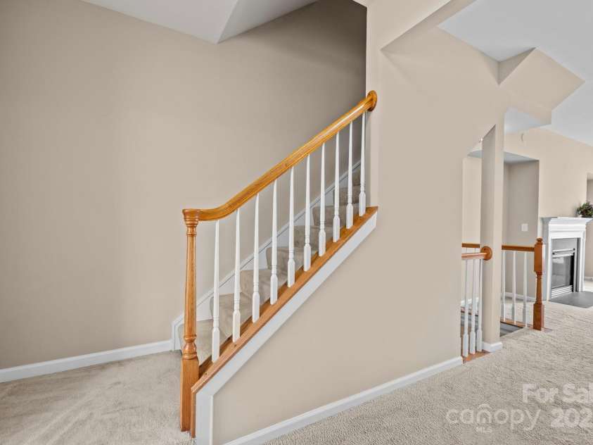 15662 King Louis Court, Charlotte, NC 28277.  MLS# CAR4227931, YatesRealty ID 6553. Stairs going to 3rd level