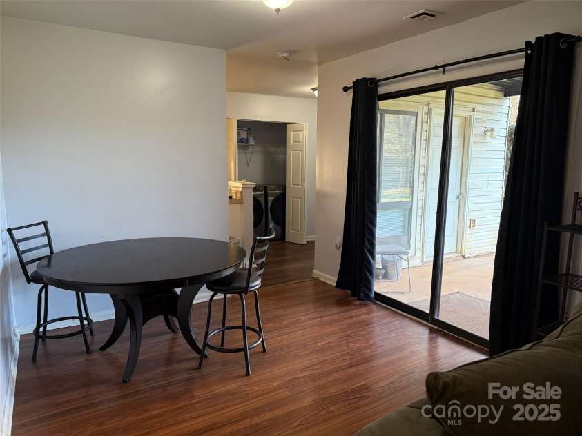 4823 Spring Lake Drive, Charlotte, NC 28212.  MLS# CAR4331709, YatesRealty ID 656. Sliding doors to covered patio