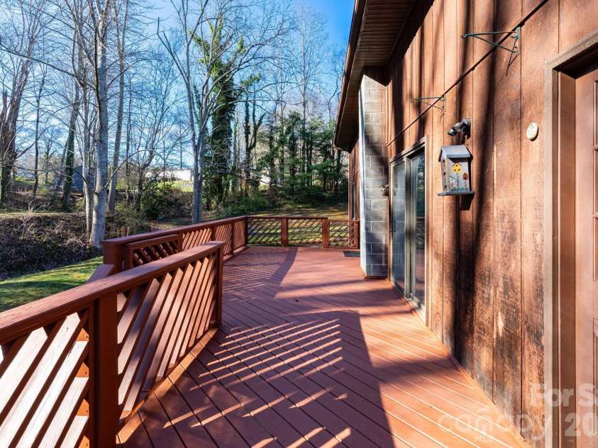 586 Justice Ridge Road, Candler, NC 28715.  MLS# CAR4359252, YatesRealty ID 6562. Back deck
