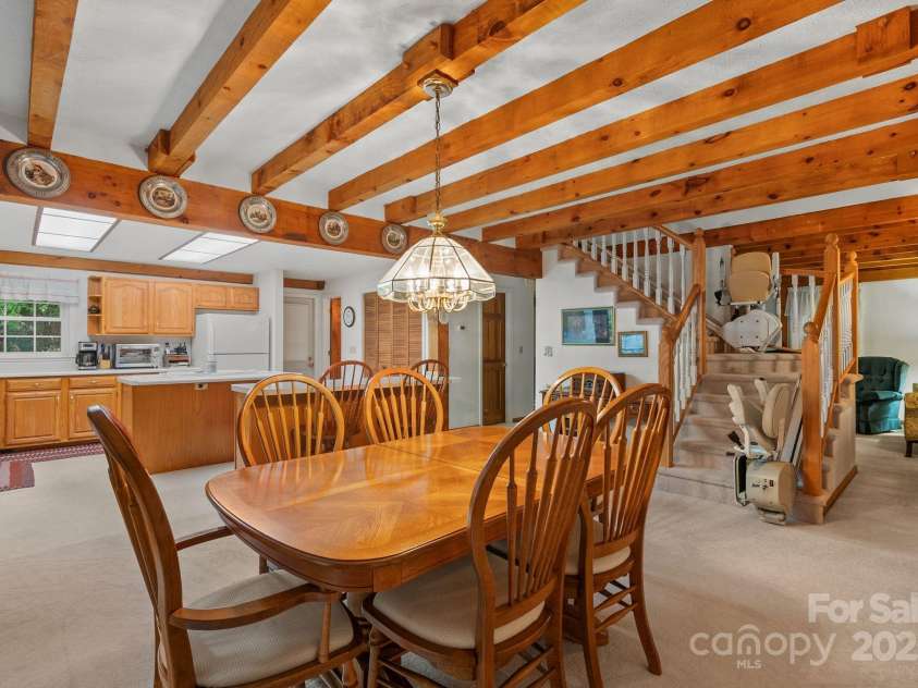 2767 Tanasee Gap Road, Balsam Grove, NC 28708.  MLS# CAR4161160, YatesRealty ID 6567. Dining room
