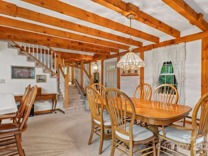 2767 Tanasee Gap Road, Balsam Grove, NC 28708.  MLS# CAR4161160, YatesRealty ID 6567. Dining room