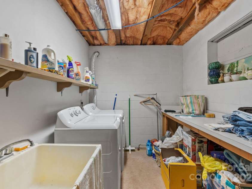 2767 Tanasee Gap Road, Balsam Grove, NC 28708.  MLS# CAR4161160, YatesRealty ID 6567. Laundry room.