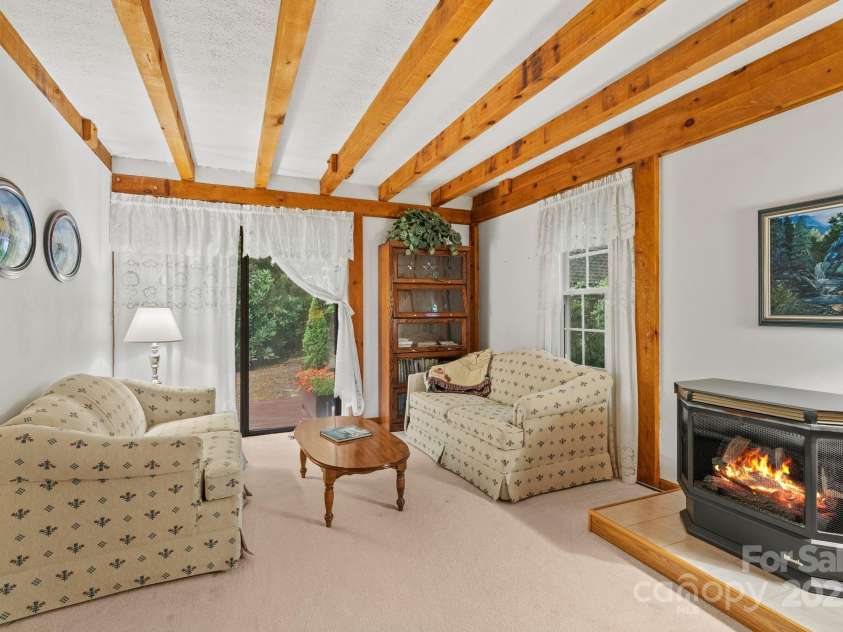 2767 Tanasee Gap Road, Balsam Grove, NC 28708.  MLS# CAR4161160, YatesRealty ID 6567. Living room