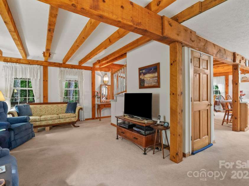 2767 Tanasee Gap Road, Balsam Grove, NC 28708.  MLS# CAR4161160, YatesRealty ID 6567. Living room