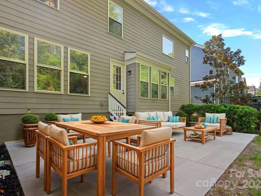 3060 Drummond Avenue, Indian Land, SC 29707.  MLS# CAR4244888, YatesRealty ID 6570. Backyard patio (virtually staged)