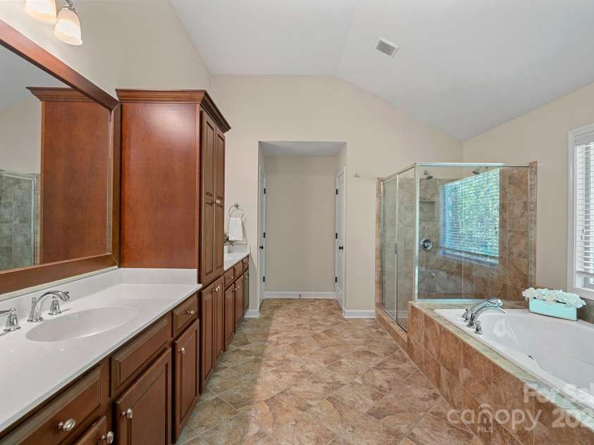 3060 Drummond Avenue, Indian Land, SC 29707.  MLS# CAR4244888, YatesRealty ID 6570. Primary bathroom, dual vanity with soaker tub