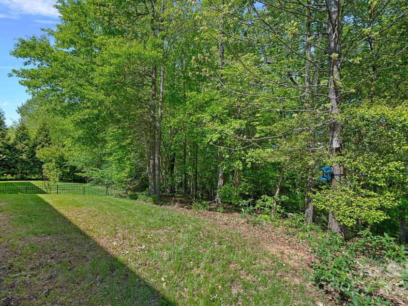 3060 Drummond Avenue, Indian Land, SC 29707.  MLS# CAR4244888, YatesRealty ID 6570. Wooded and semi private backyard