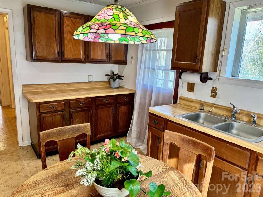 67 Shawnee Trail, Asheville, NC 28805.  MLS# CAR4331437, YatesRealty ID 6571. Door to back Deck