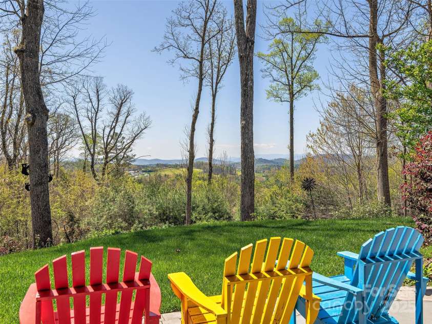 125 Lindsley Court, Hendersonville, NC 28792.  MLS# CAR4245651, YatesRealty ID 6574. Chairs off downstairs Family Room