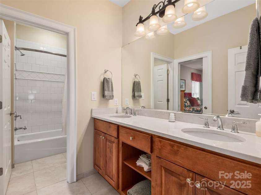 125 Lindsley Court, Hendersonville, NC 28792.  MLS# CAR4245651, YatesRealty ID 6574. Downstairs Bathroom