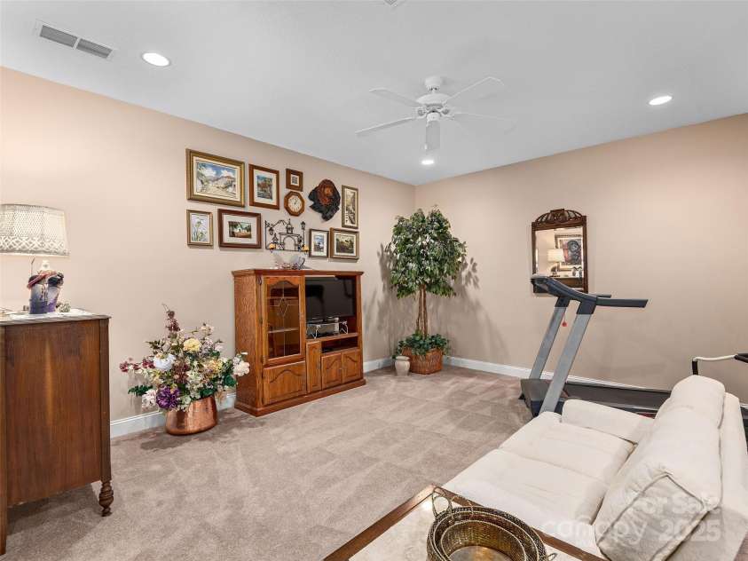 125 Lindsley Court, Hendersonville, NC 28792.  MLS# CAR4245651, YatesRealty ID 6574. Exercise Area in Pool Room
