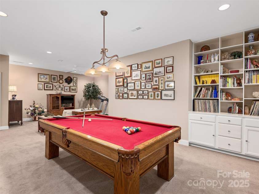 125 Lindsley Court, Hendersonville, NC 28792.  MLS# CAR4245651, YatesRealty ID 6574. Pool Room off Downstairs Family Room