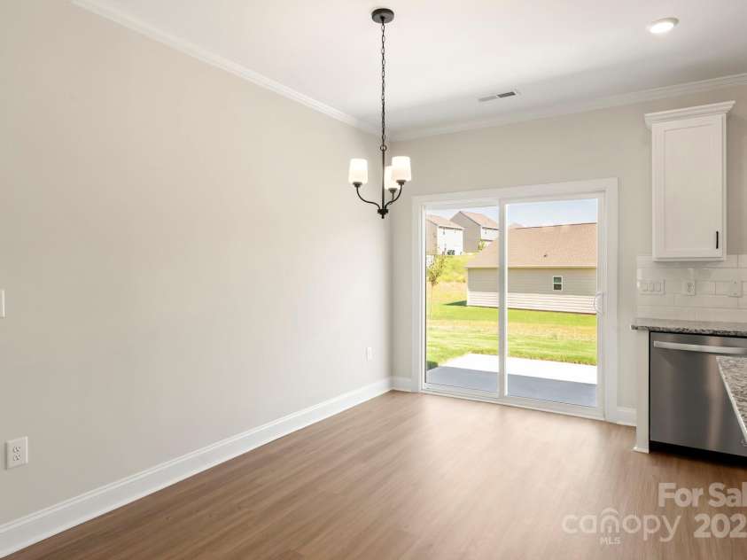 124 Rills Crossing Way, Troutman, NC 28166.  MLS# CAR4334341, YatesRealty ID 6578. Dining room