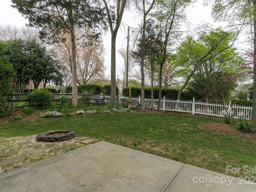 108 Kinderston Drive, Davidson, NC 28036.  MLS# CAR4242010, YatesRealty ID 6579. Fire pit in back yard.