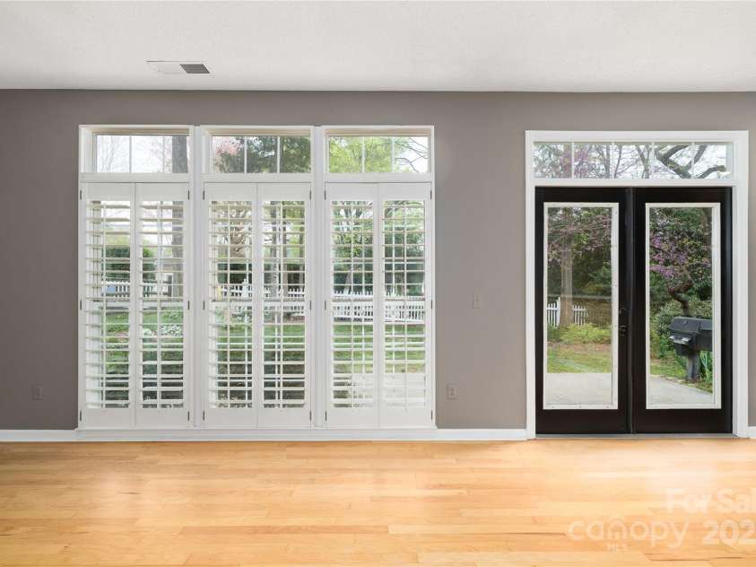 108 Kinderston Drive, Davidson, NC 28036.  MLS# CAR4242010, YatesRealty ID 6579. Great Room walks out to patio.