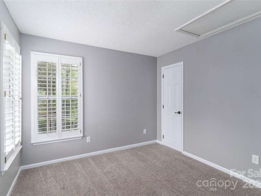 108 Kinderston Drive, Davidson, NC 28036.  MLS# CAR4242010, YatesRealty ID 6579. Lots of windows in secondary bedrooms.