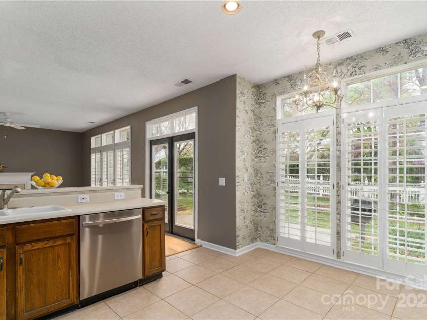 108 Kinderston Drive, Davidson, NC 28036.  MLS# CAR4242010, YatesRealty ID 6579. Newer dishwasher, microwave and kitchen faucet.