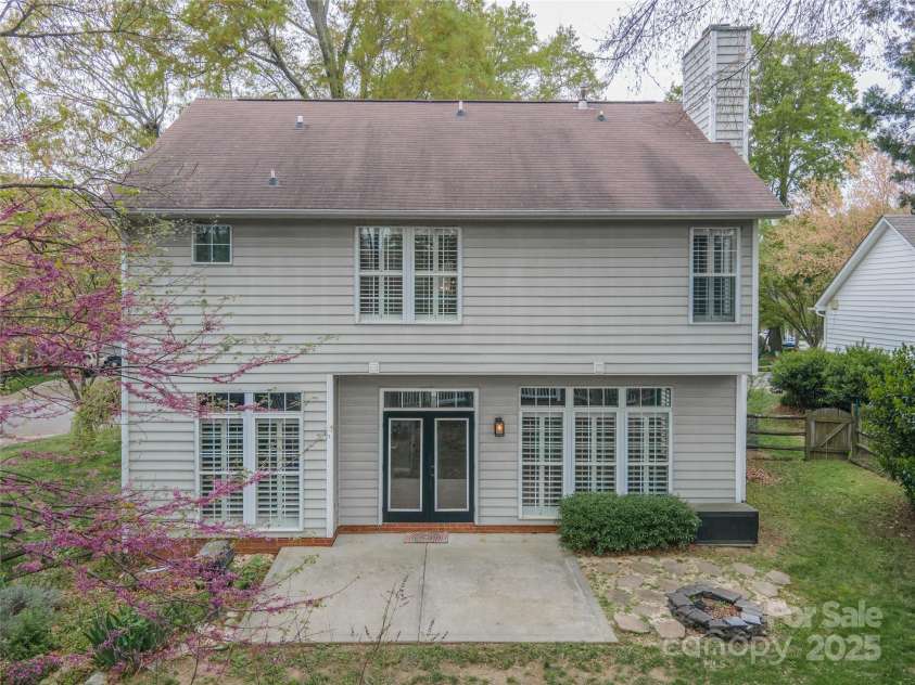 108 Kinderston Drive, Davidson, NC 28036.  MLS# CAR4242010, YatesRealty ID 6579. Rear view of home.