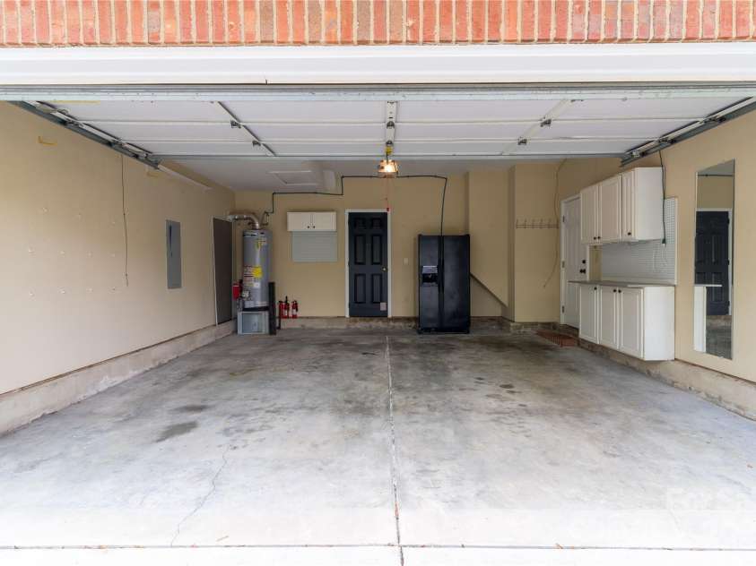 108 Kinderston Drive, Davidson, NC 28036.  MLS# CAR4242010, YatesRealty ID 6579. Two car garage has room for extra refrigerator and storage.