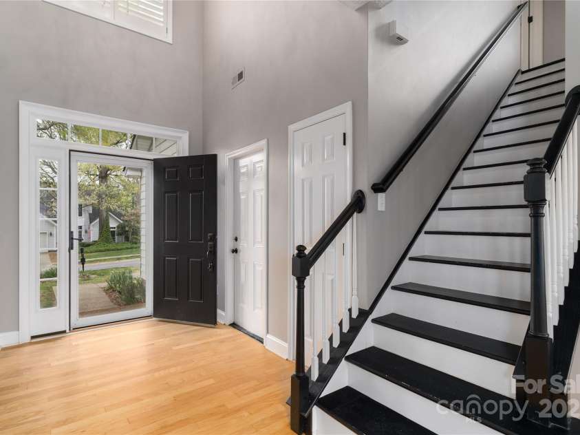 108 Kinderston Drive, Davidson, NC 28036.  MLS# CAR4242010, YatesRealty ID 6579. Wood flooring in Foyer and wood treads on stairs.