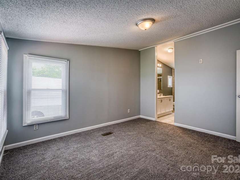 707 Cool Spring Road, Statesville, NC 28625.  MLS# CAR4142218, YatesRealty ID 6588. 